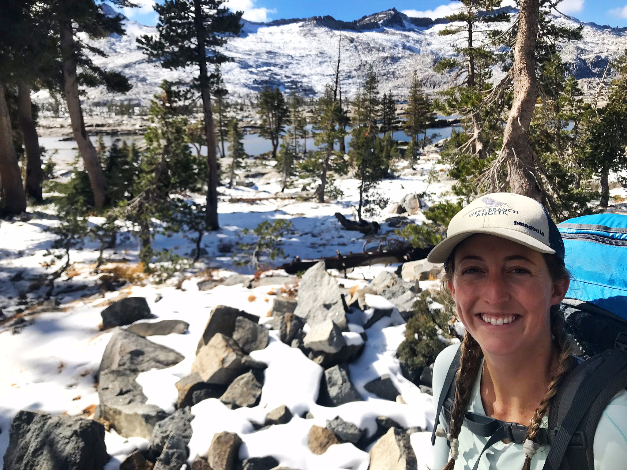 Molly P VandenBerg backpacking in the mountains